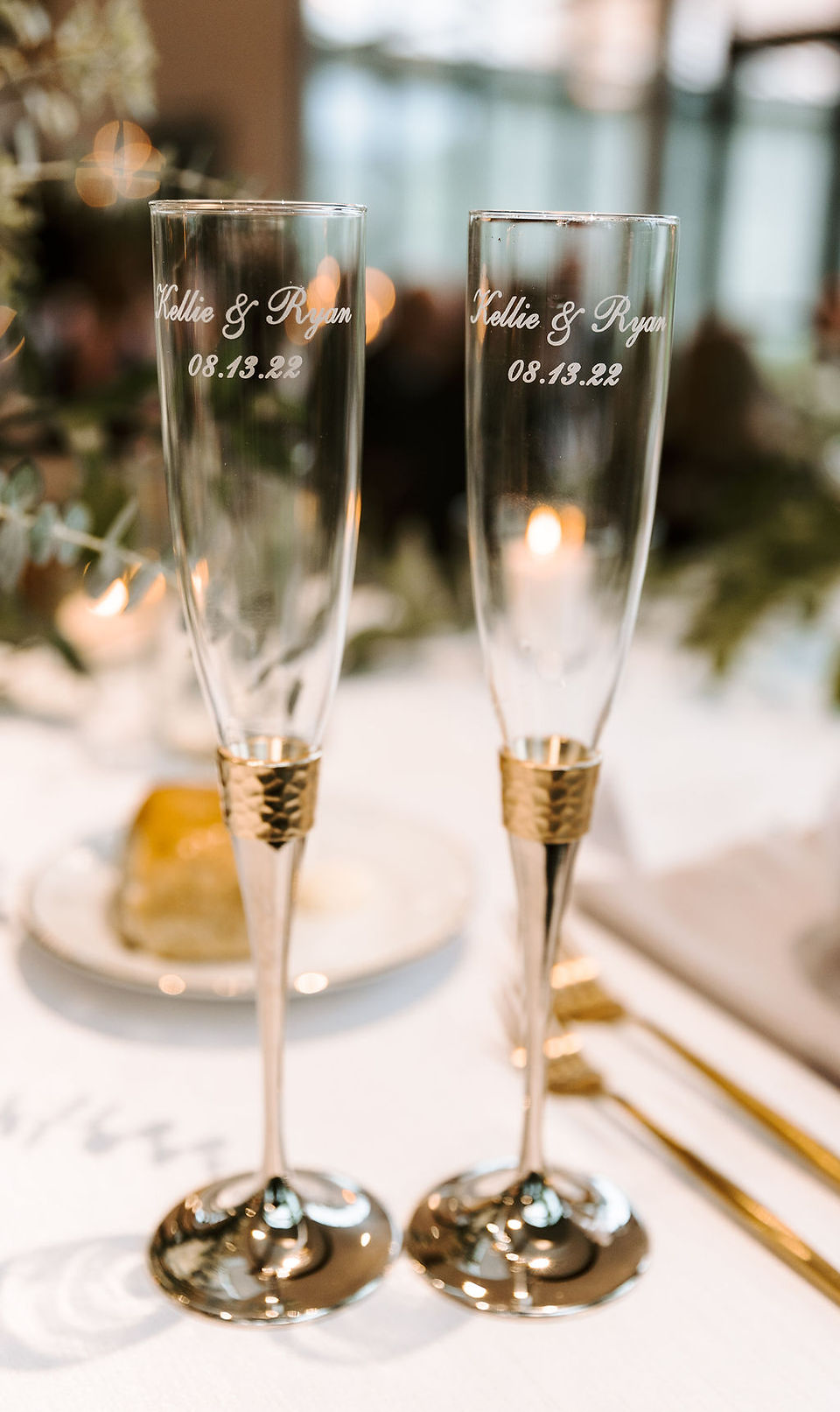 Custom bride and groom gold wedding champagne glasses.