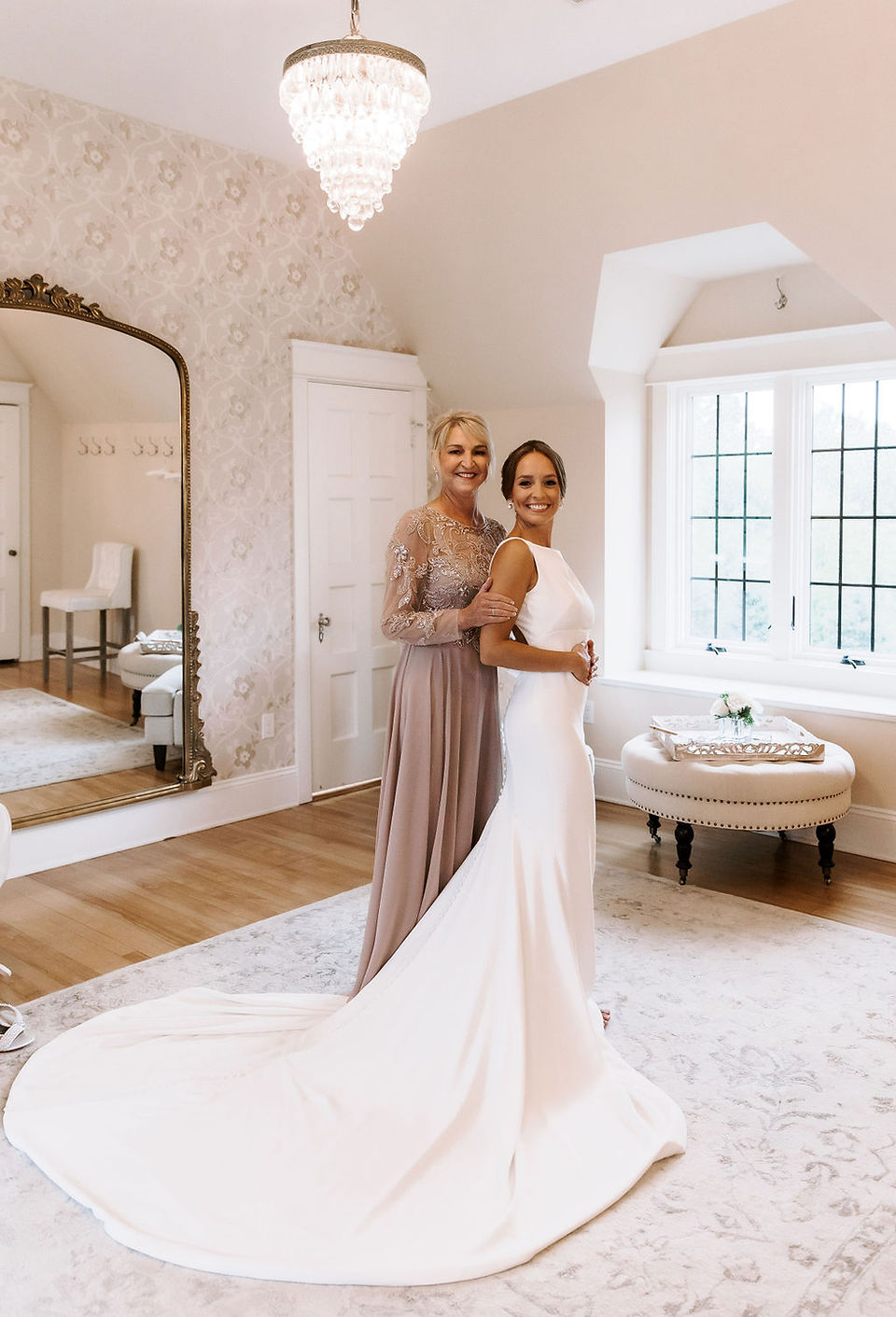 Bride and mother of the bride on her wedding day at Venue3Two in Michigan.