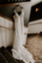 Michigan wedding venue Walloon Lake Hotel bridal suite and wedding dress details.