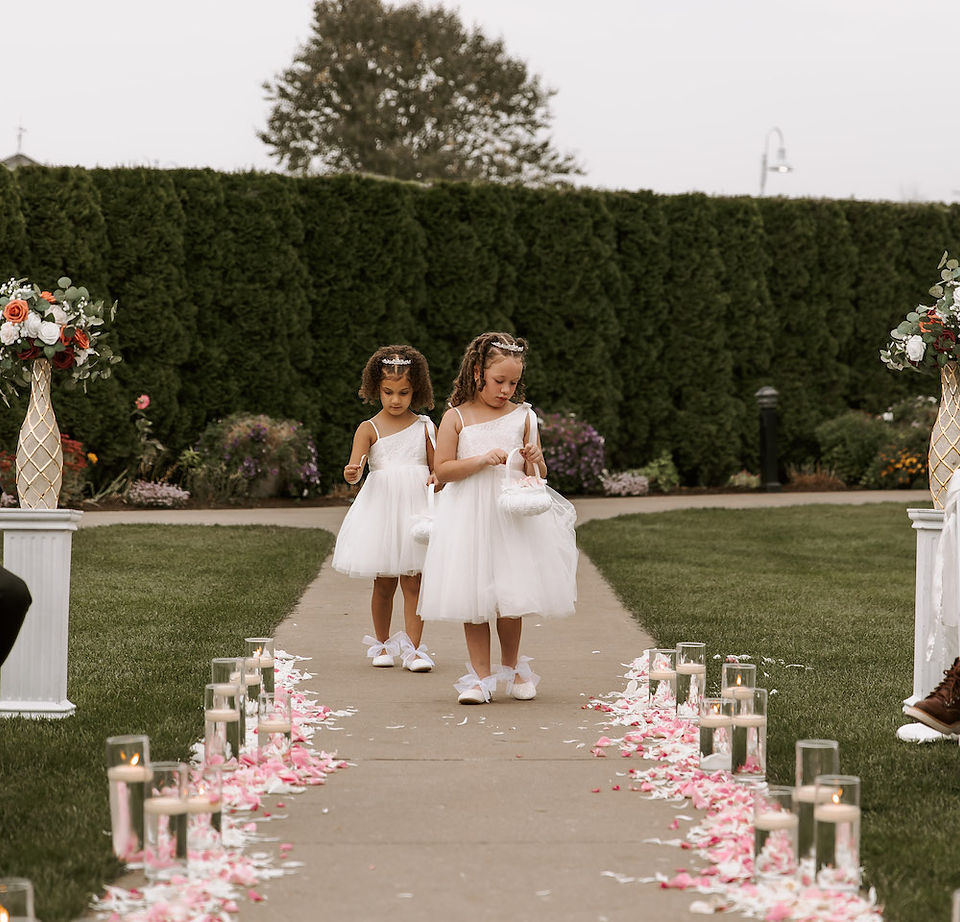 Glamorous castle wedding flower girls. 