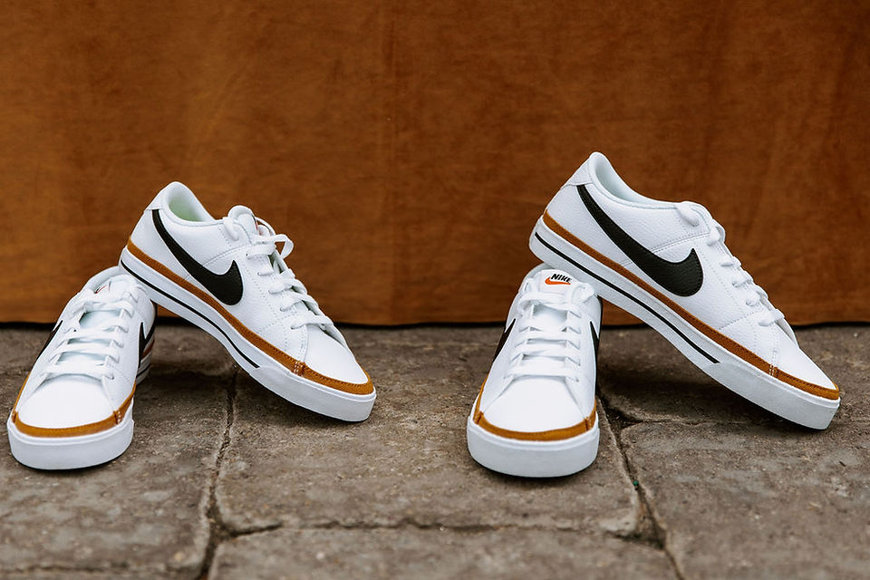 His and her matching Nike Blazers. 