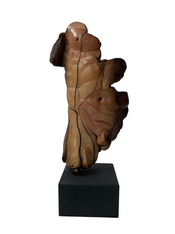 ceramic sculptures male and female figures marble base beige warm tones