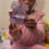 Thumbnail: Child girl unboxing the Easter-in-a-Box, discovering toys, Scripture bookmark, storybooks, and Christian activities.