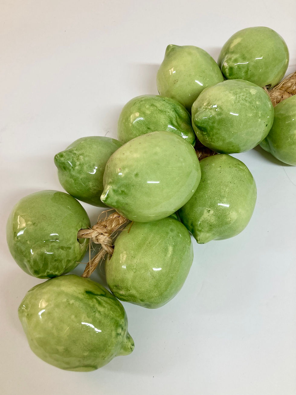 Thumbnail: Italian Ceramic Glazed Green Limes on Straw