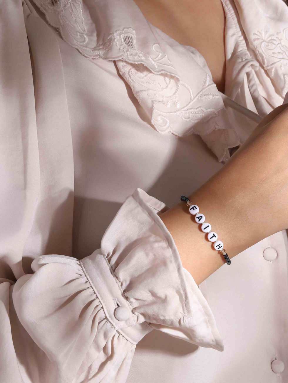 FAITH steel blue Miyuki glass and champagne Preciosa crystal beaded bracelet on wrist