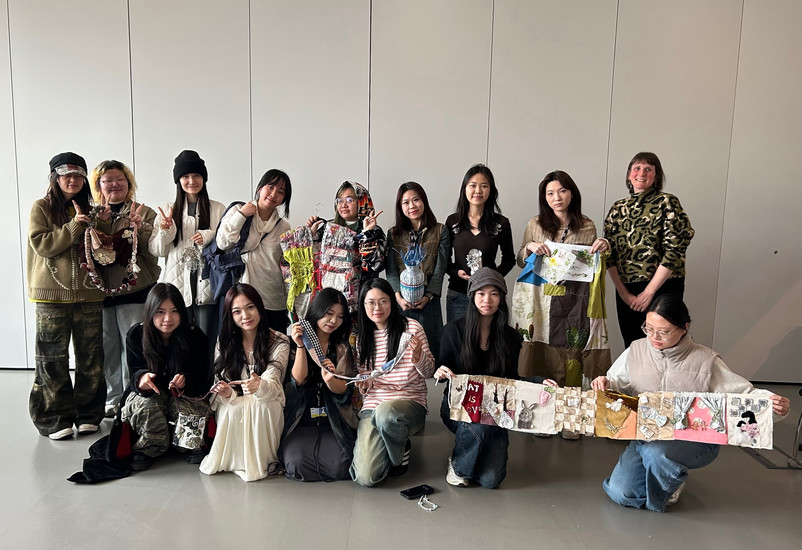 Group of LCF students showcasing their work in response to the 'Pockets of Love' DAL brief. 