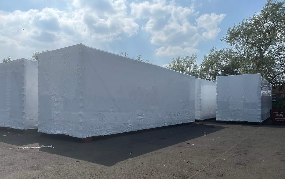 EcoShrink heat shrink wrap protecting modular buildings – recyclable single-use alternative for UK construction sites