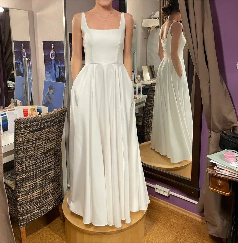 Änderungen des Hochzeitskleides schnell und perfekt aus der Schneiderei Graz von Beata Teni Kis.