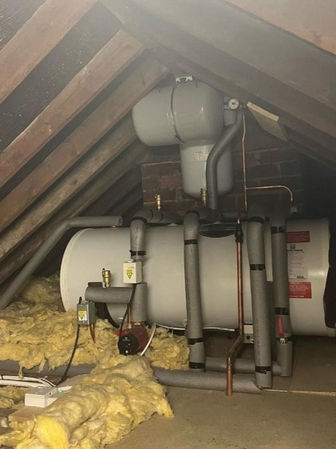 An image of an unvented cylinder installed in the attic