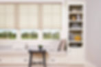 Hunter Douglas cordless shades blocking light in a bedroom near Brentwood, CA