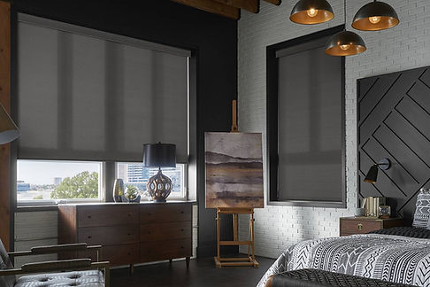 Alta® Shades blocking light in a bedroom near Brentwood, CA