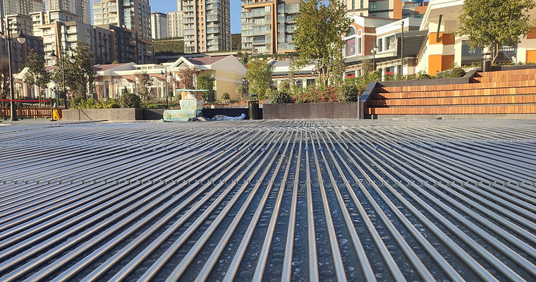 Aluminum box-profile collector piping laid out on-site before ice installation at Tema World, Istanbul