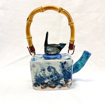porcelain and bamboo teaport with landscape and fairy wren