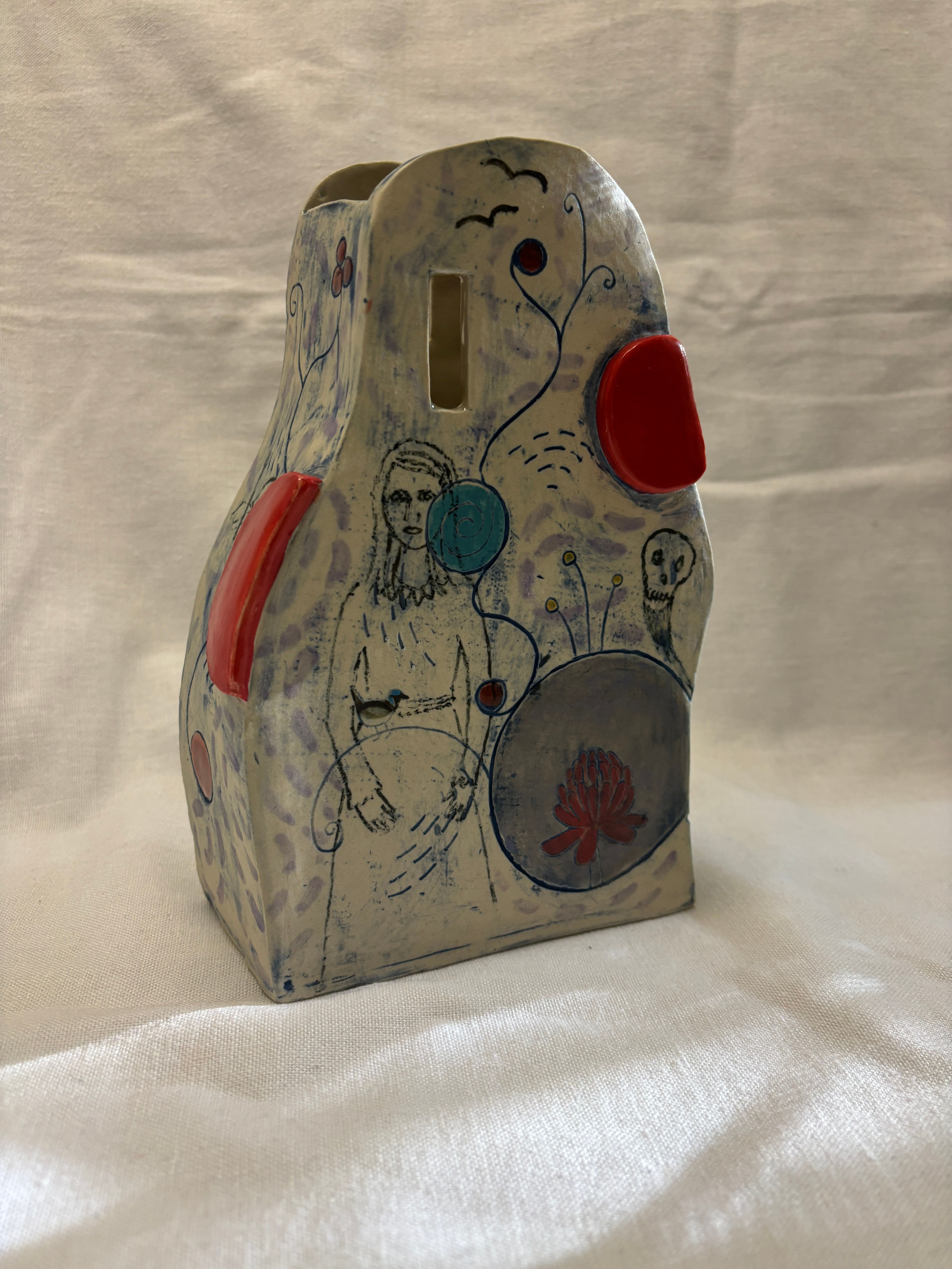 handmade abstract stoneware vase with girl