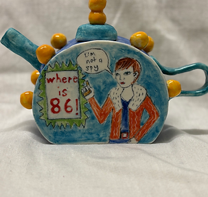 teapot with comic max and 99