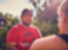 Michael Calvillo owner of Redbird Services smiling talking with client