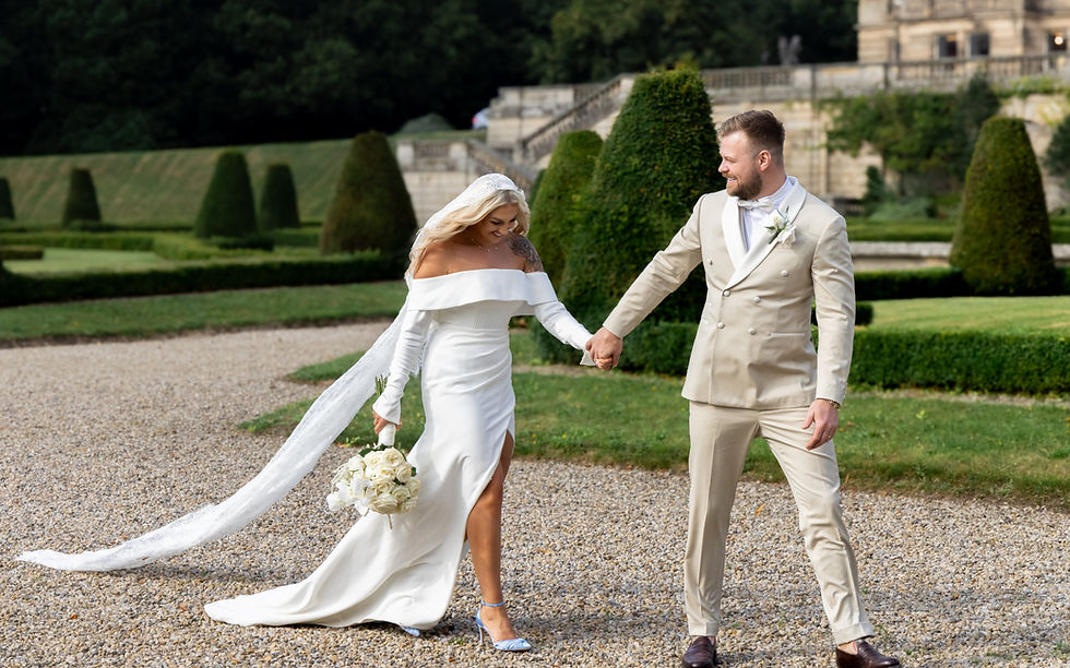 wedding couple walking holding hands