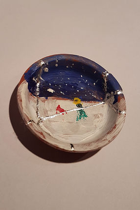 Kintsugi lagning förgylld med vitguld