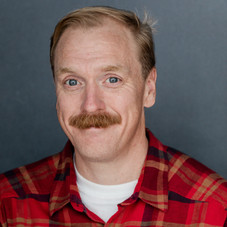 TIM DLM HEADSHOT LIGHT BG.jpeg