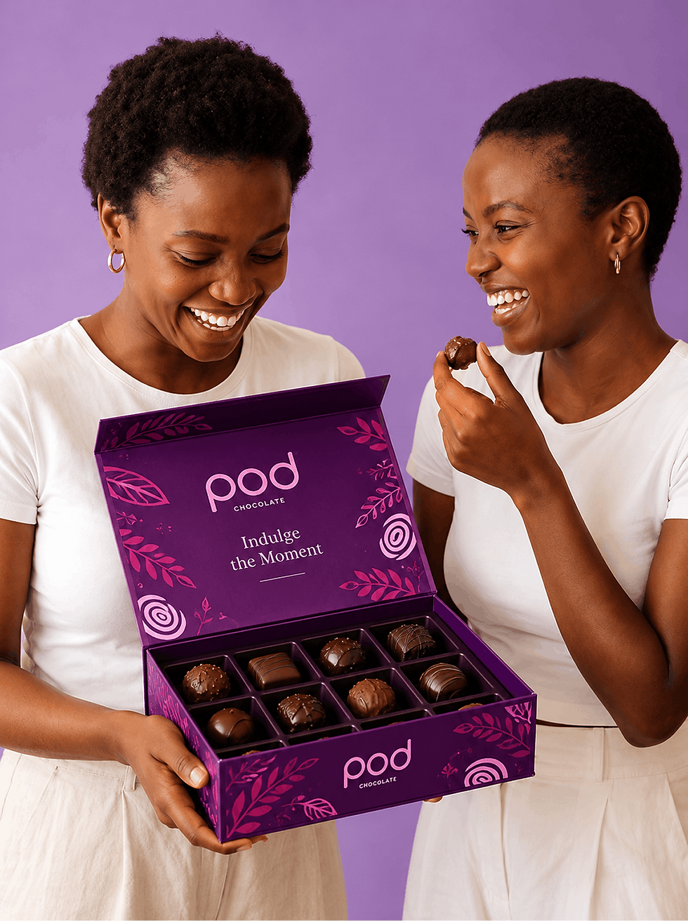 Two ladies sharing and eating Pod chocolate with POD lovely packaging box