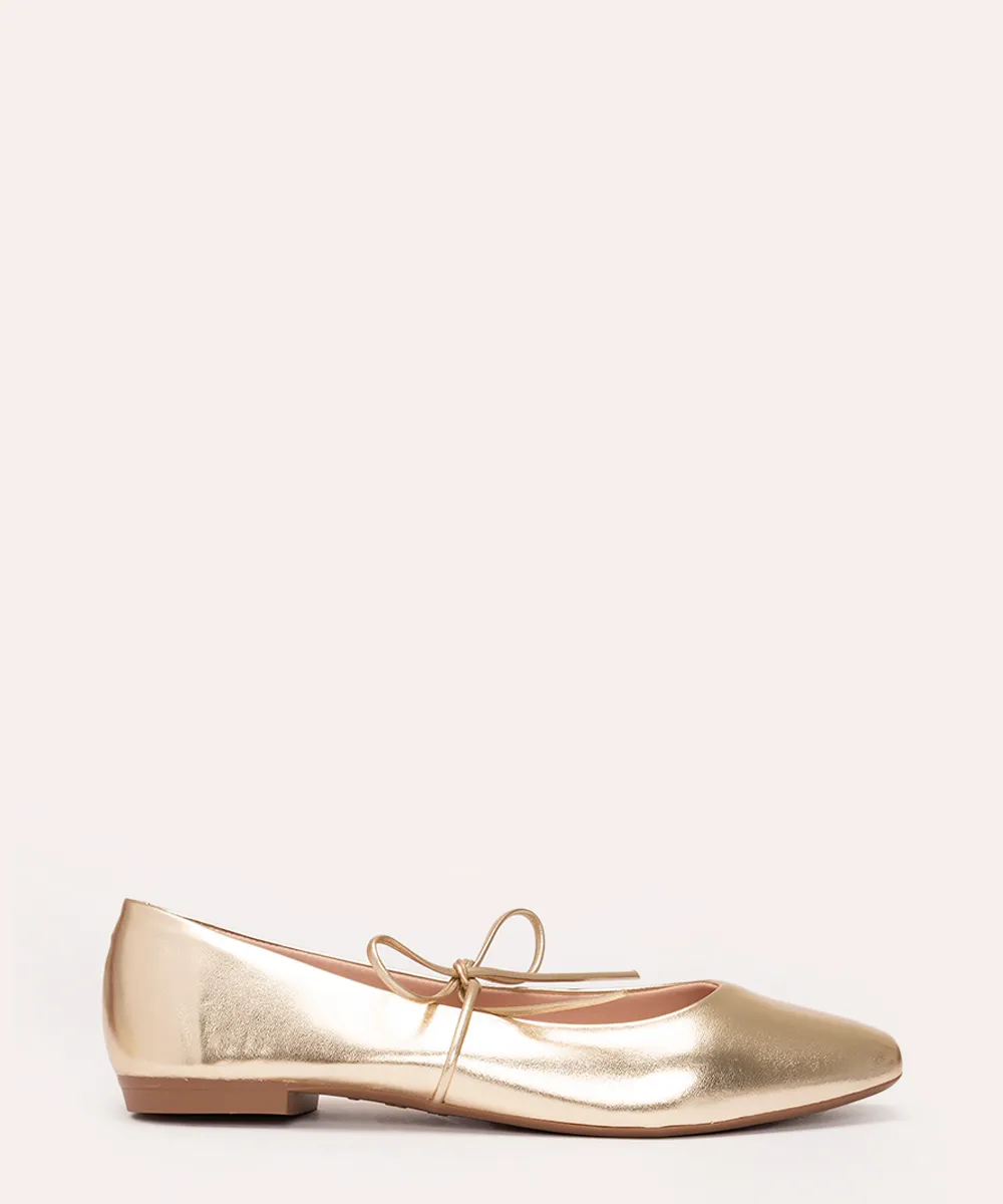 sapatilha dourada comn amarração