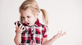 Young girl frustrated, talking loudly on phone