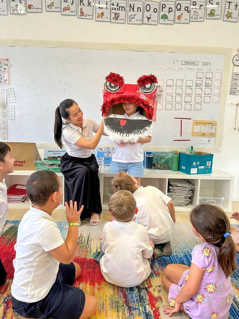 Students crafted Nian's head to bring prosperity to families and Astor school community