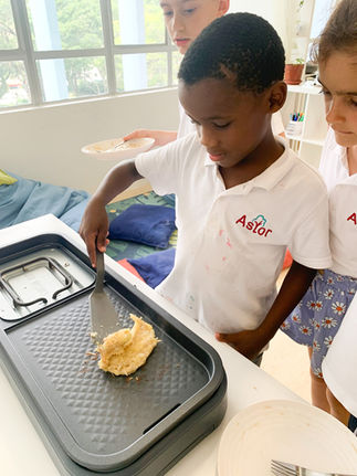 Learning mandarin while cooking at Astor International School