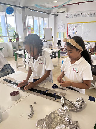 Astor kids work collaboratively