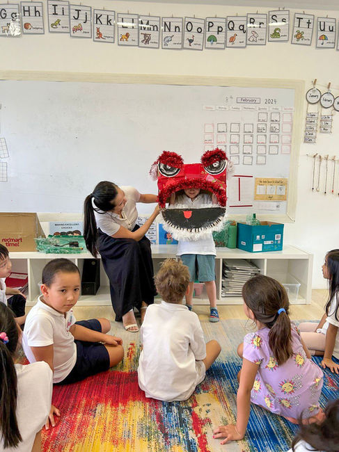 Students crafted Nian's head to bring prosperity to families and Astor school community