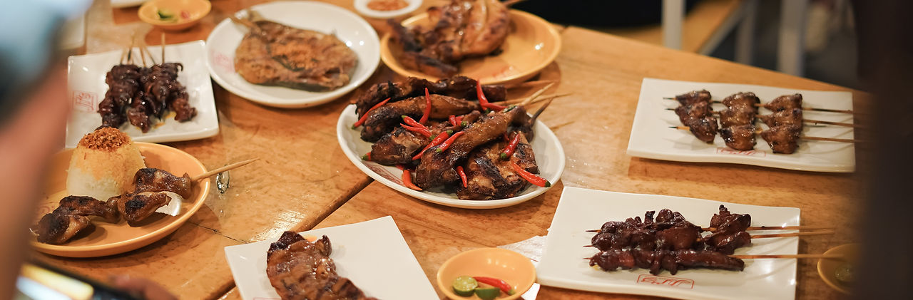 JT's Manukan Grille Spicy Paa with other Dishes.jpg