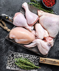 raw-chicken-pieces-on-a-cutting-board-2026-03-16-04-59-52-utc.JPG