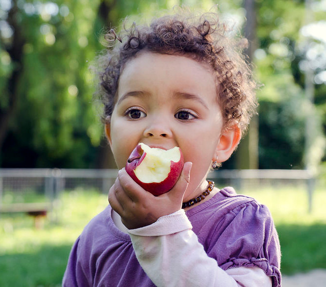 baby eating apple.jpg