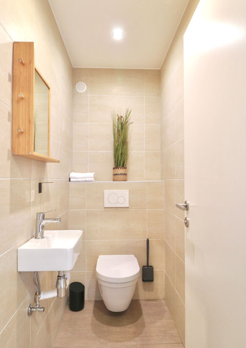 Zweites separates Badezimmer mit bodengleicher Dusche – ideal für Gruppen von bis zu 6 Personen.