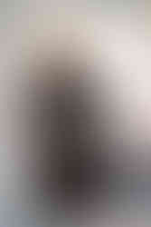 Paola Navone sitting on a sofa photo 