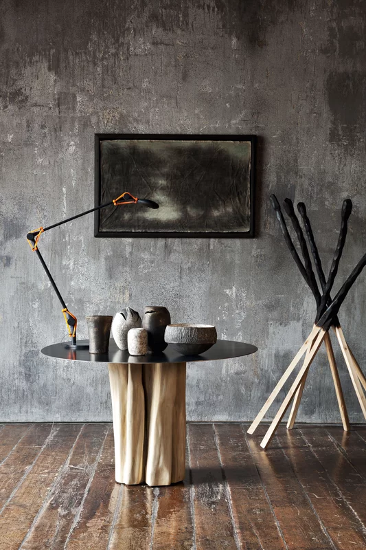 Brick 38 table by Paola Navone and a clothes and hat hanger 