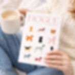 Dog illustrated A5 notebook held by person