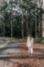 Pregnant woman walking in nature