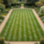 Elegant garden with striped lawn and flowerbeds