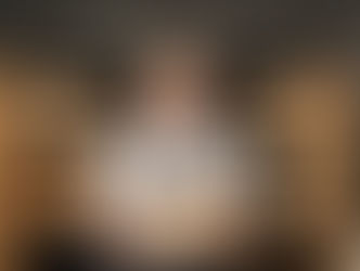 Cheese monger with aged cheddar