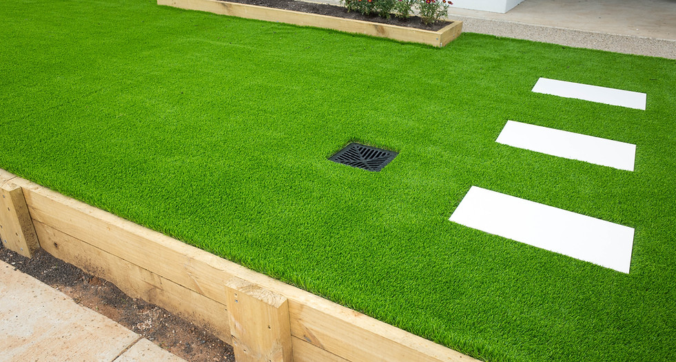 Artificial grass_lawn turf in the front yard of a modern home_residential house..jpg