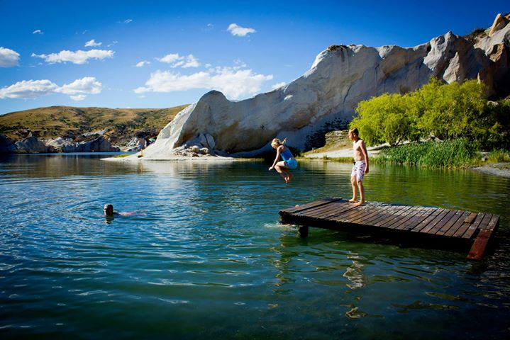 Jumping into Blue Lake.
