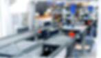The production and assembly line of lithium battery module in EV industry, transported by pallet conveyor systems.