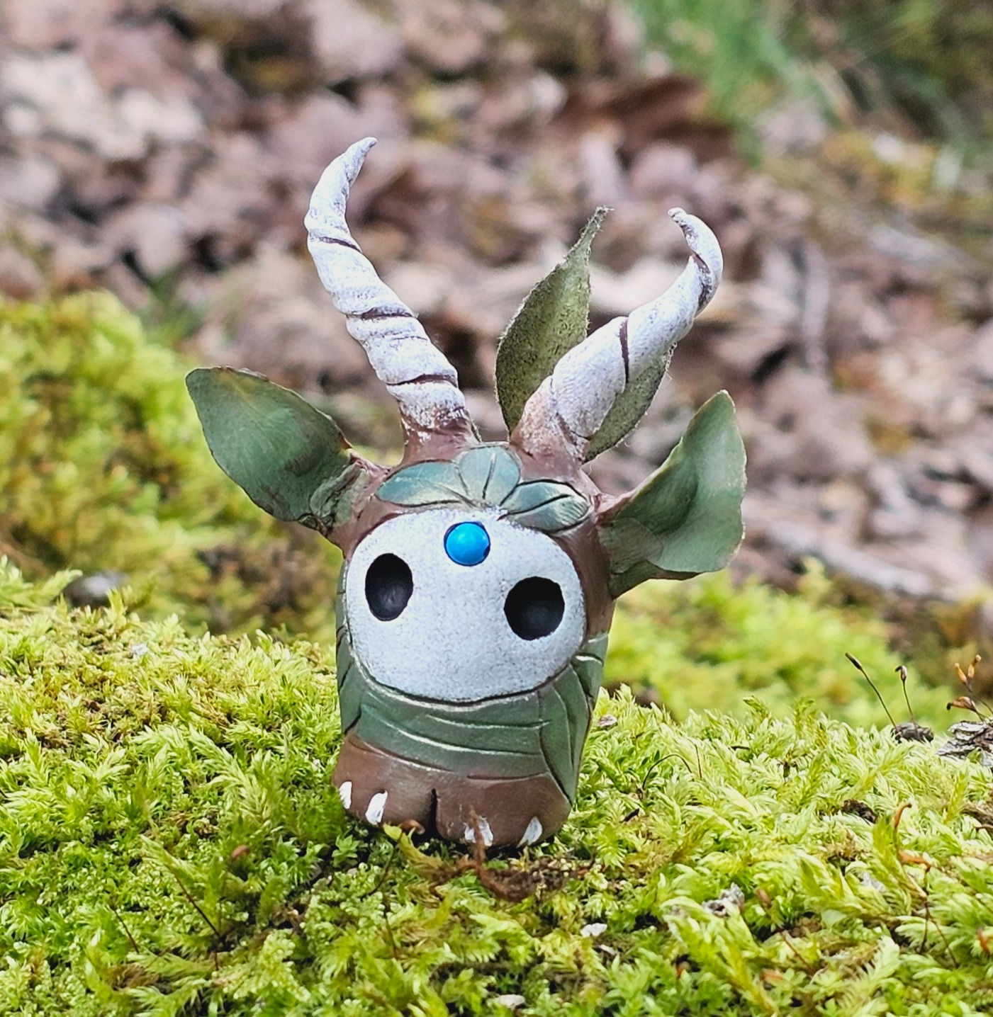 This Tiny Beastie is rather delicate, with graceful, twisting Horns and inquisitive, Leafy ears.