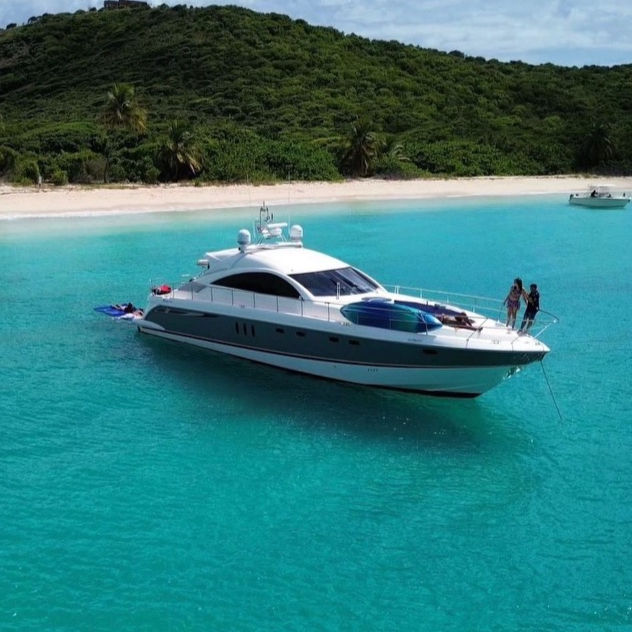 Dakiti 60 foot luxury yacht charter anchored near a tropical beach in Puerto Rico.