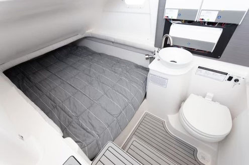 Interior air-conditioned cabin berth inside the Sea Fox 36 private boat rental.