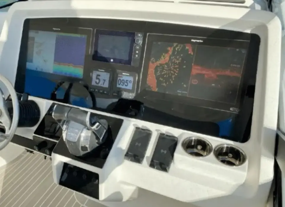 Modern helm station and navigation screens on the Intrepid 47 boat tour in Fajardo.