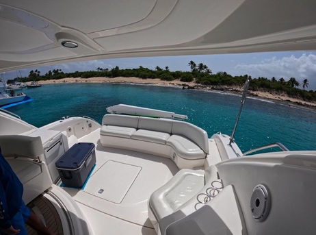 Spacious aft deck seating and lounge area on the Sea Ray 55 luxury boat tour.