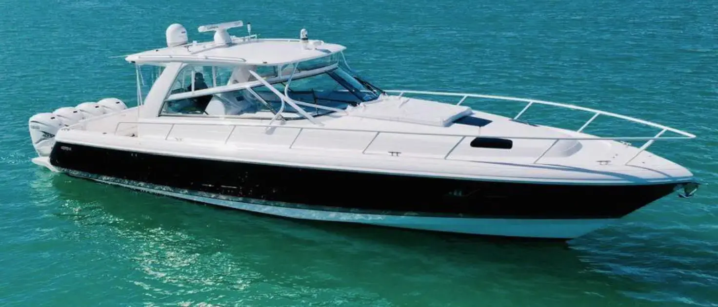 Intrepid 47 foot private boat charter anchored in clear waters of Puerto Rico.