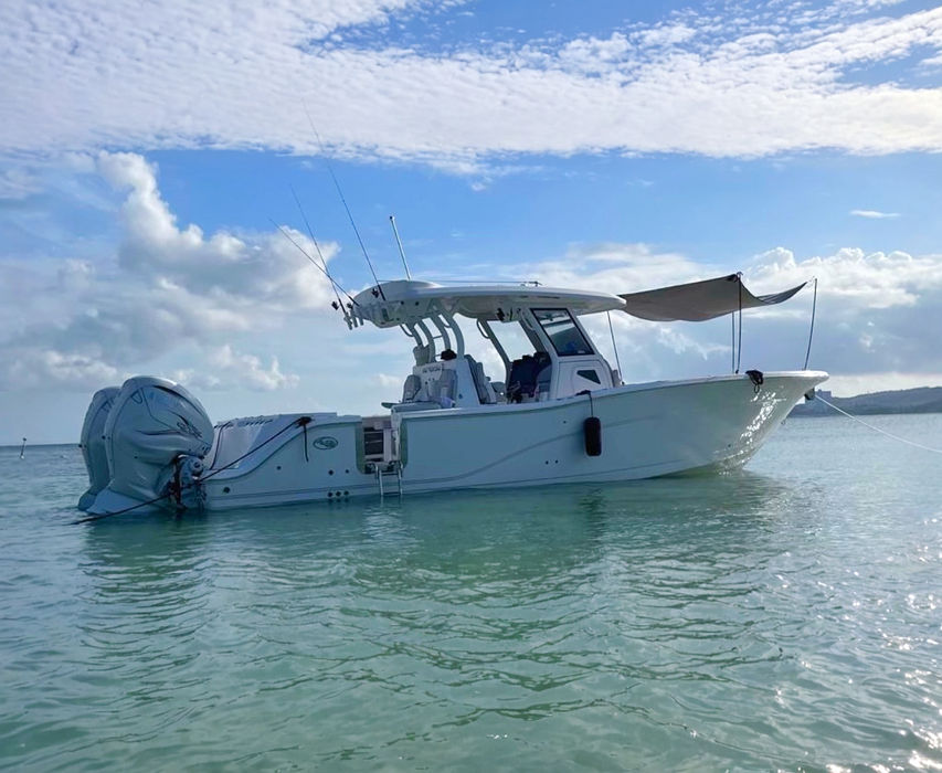 Sea Fox 36 foot center console private boat charter anchored in clear Puerto Rico waters.